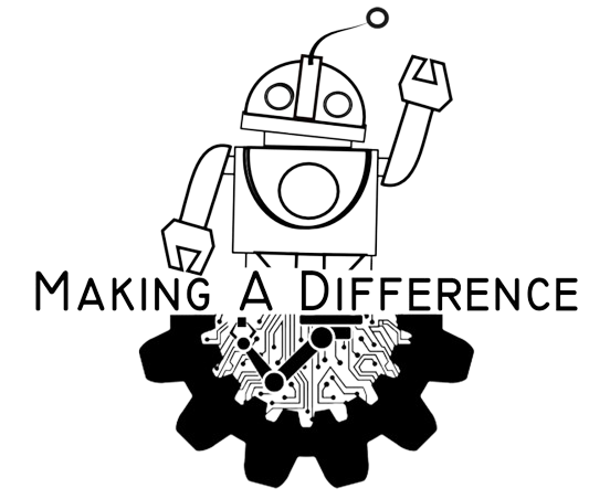 Photo of students driving their Vex IQ robots durring M.A.D. Summer Camp.